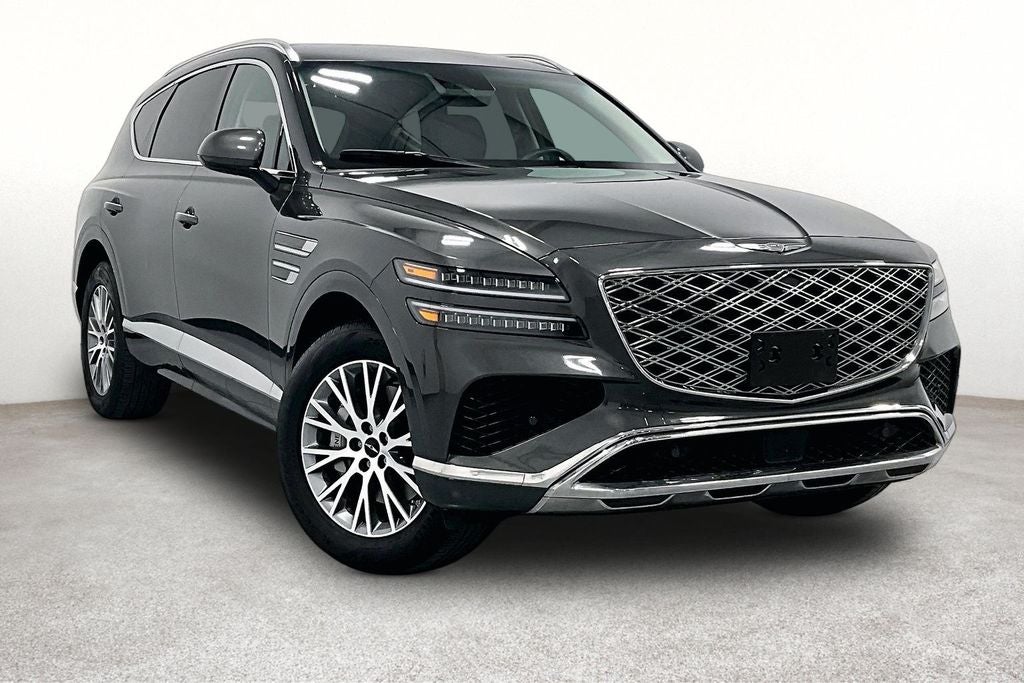 2025 Genesis GV80 2.5T in Makalu Gray — front three-quarter view