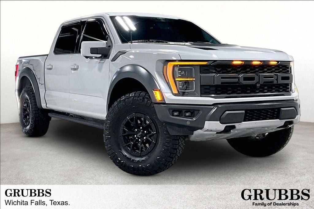 2023 Ford F-150 Raptor in Avalanche Gray — front three-quarter view