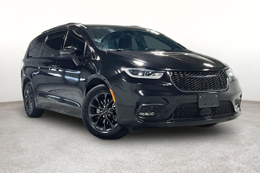 2021 Chrysler Pacifica Touring in Brilliant Black Crystal Pearlcoat — front three-quarter view