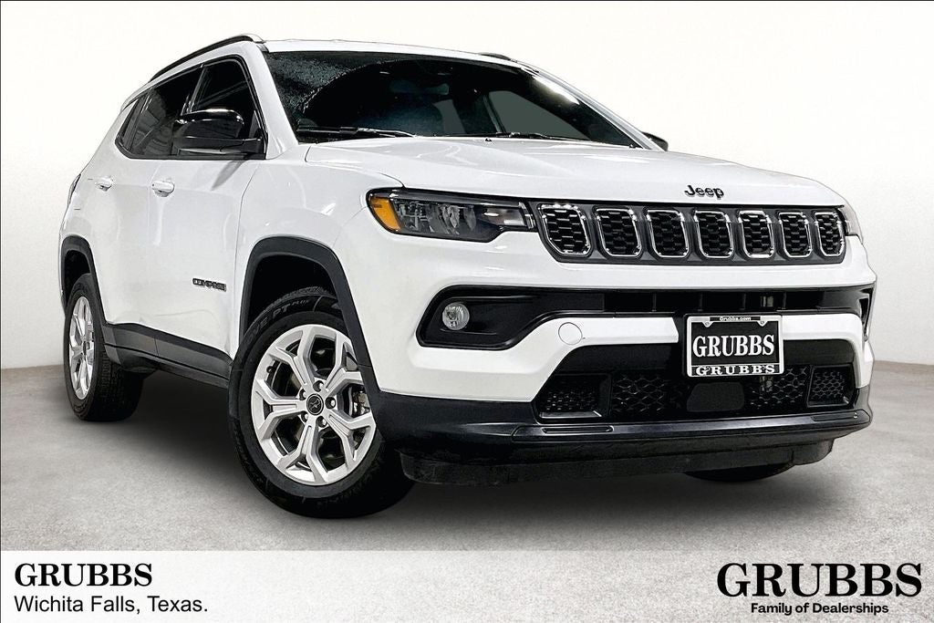 2025 Jeep Compass Latitude in Bright White Clearcoat — front three-quarter view