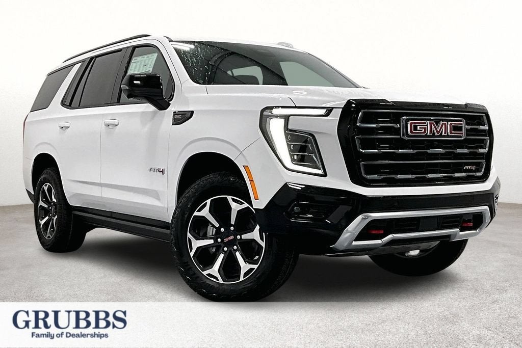 2026 GMC Yukon AT4 in Summit White — front three-quarter view