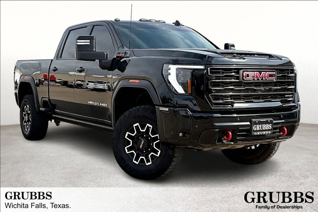 2025 GMC Sierra 2500 HD AT4X in Onyx Black — front three-quarter view