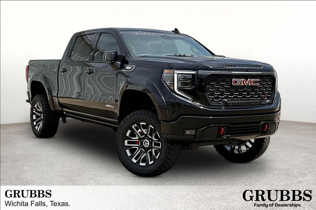 2026 GMC Sierra 1500 AT4 in Onyx Black — front three-quarter view